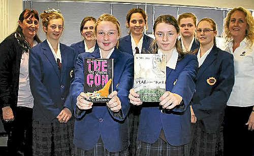 Warwick High School Year 9 pupils Sarah Kane and Emily Plant, with (back) librarian Janet Williams, Clara Maw, Maggie Hay, Lauren Drewery, Georgia Butler, Jacqui MacKinnon and English teacher Kirsty Caterson. Warwick High School Year 9 pupils Sarah Kane and Emily Plant, with (back) librarian Janet Williams, Clara Maw, Maggie Hay, Lauren Drewery, Georgia Butler, Jacqui MacKinnon and English teacher Kirsty Caterson.